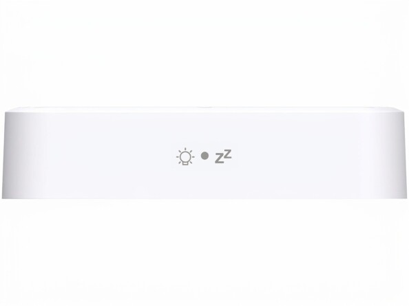 Face avant du réveil radio-piloté blanc aux lignes épurées avec icône d'ampoule, un point et le symbole « zZ » du sommeil
