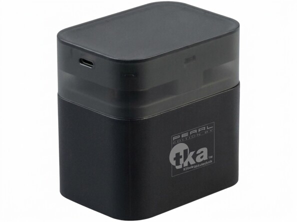 Chargeur universel tka fermé avec port USB-C et marquage Kabellose Zusatzladung sur la face avant