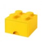 Brique de rangement LEGO jaune.