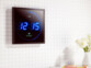 Horloge digitale murale radiopilotée à LED bleues de la marque Lunartec