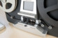 Passage d'une bobine de film dans un scanner autonome de pellicule