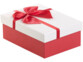 3 paquets-cadeaux avec boucle rouge