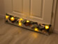 2 coussins de porte à 7 LED avec motifs de Noël - 90 x 20 cm