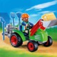 Agriculteur Playmobil avec son tracteur et de nombreux accessoires.