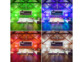 Mise en situation des ampoules LED dans quatre couleurs d'éclairage différentes (vert, bleu, rouge et blanc) dans un salon mansardé avec canapé d'angle et table basse