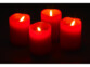 4 bougies de l'Avent LED allumées dans le noir et brillant d'une lumière jaune blanc chaud