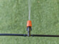 Système d'irrigation mis en fonction avec la possiblité de regler son jet d'eau